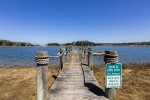 Dock Access to Mill Pond with a small beach to sit and enjoy the water